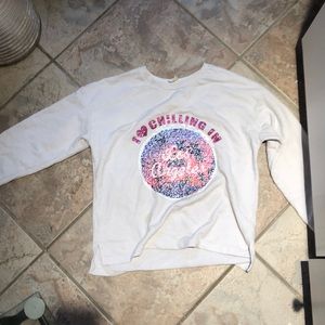 A white switch sweater